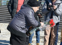 Baku residents bringing flowers to Seaside Boulevard to honor missing oil workers.  Azerbaijan, Dec.07, 2015